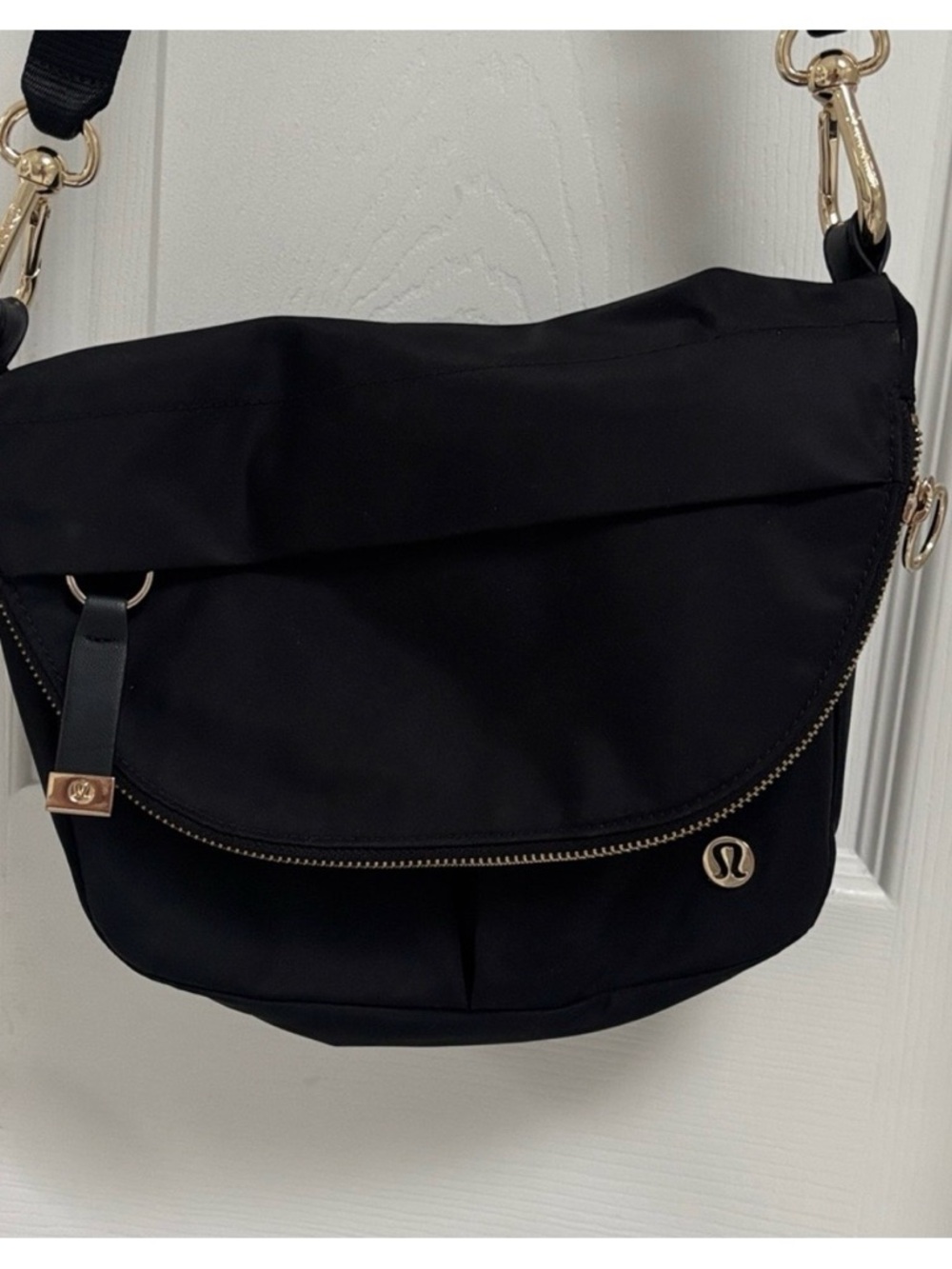 lululemon athletica Black Crossbody Bag with Gold Hardware Accents